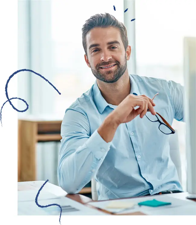 Man with glasses at desk